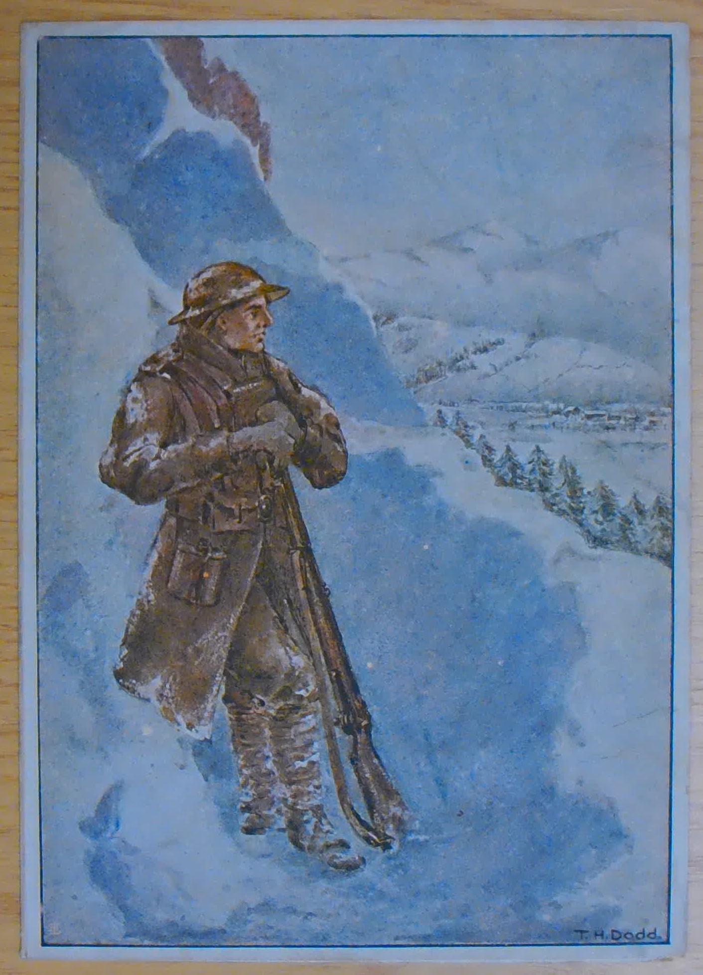 First World War Christmas card showing a soldier in snow