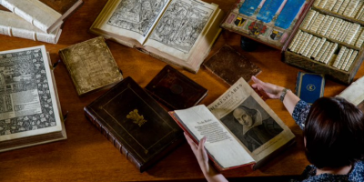 Books and items from the Brotherton Collection open on a table.
